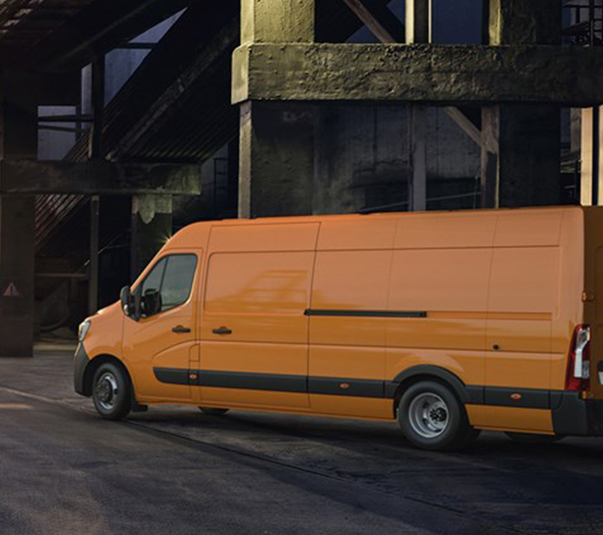 an orange renault new master